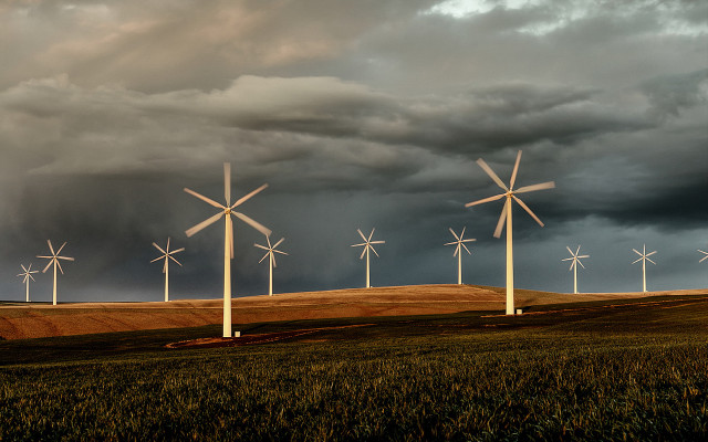 Wind turbines hill cloudy sky free wallpaper for desktop - medium preview image