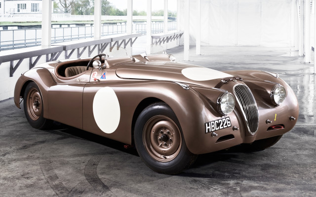 Brown race car white spots free wallpaper for desktop - medium preview image