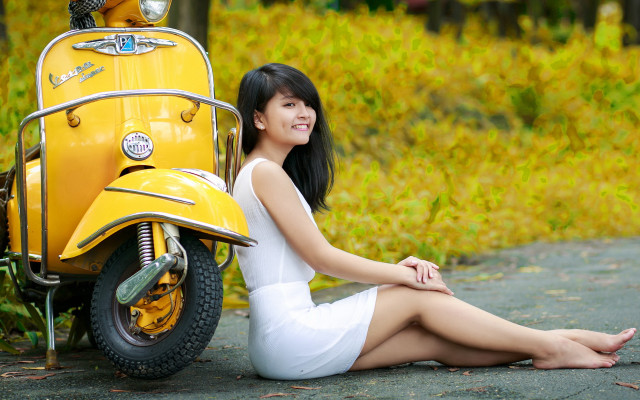 Woman sitting yellow scooter autumn free wallpaper for desktop - medium preview image