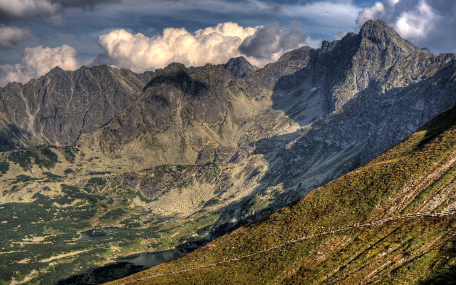 Mountain range clouds grassy fence free wallpaper for desktop - medium preview image