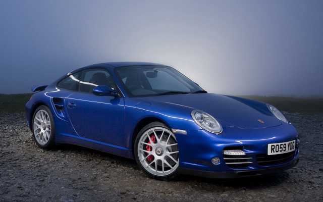 Blue sports car foggy evening free wallpaper for desktop - medium preview image