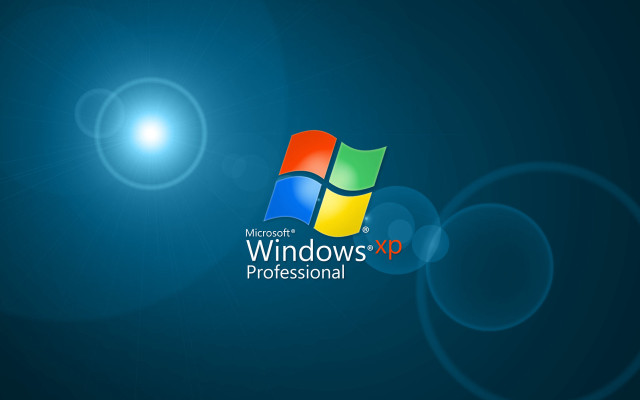 Blue background windows xp logo #4 free wallpaper for desktop - medium preview image