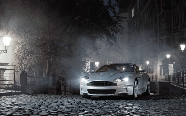 White car cobblestone night street free wallpaper for desktop - medium preview image