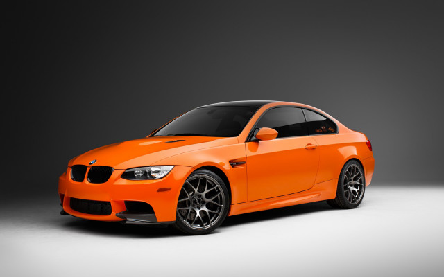 Bright orange car studio render free wallpaper for desktop - medium preview image
