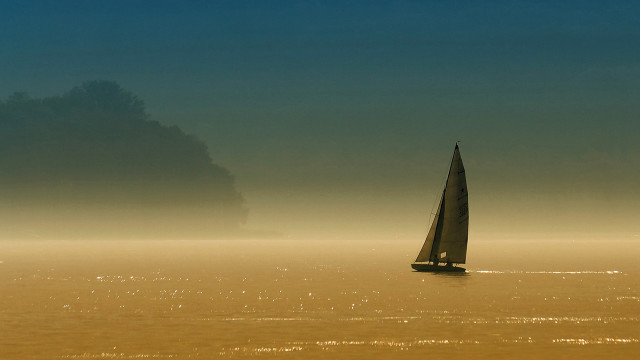 Sailboat foggy lake tranquil beach free wallpaper for desktop - medium preview image
