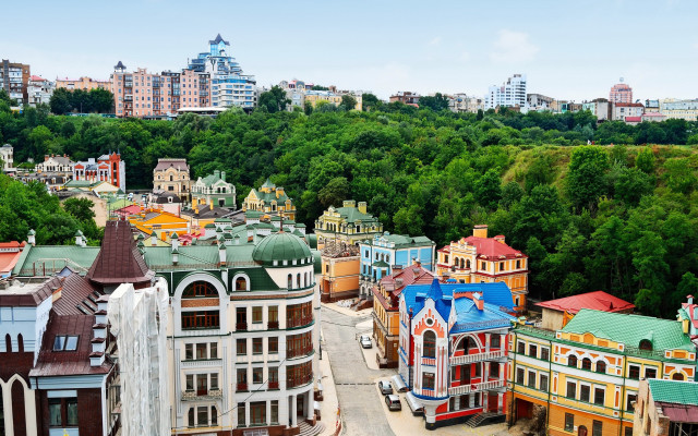 Colorful cityscape trees blue sky free wallpaper for desktop - medium preview image