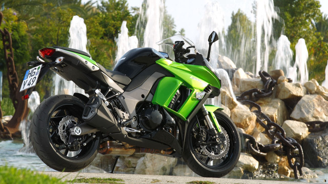 Green motorcycle fountain forest hill free wallpaper for desktop - medium preview image