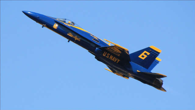 Blue yellow jet sky puzzle free wallpaper for desktop - medium preview image