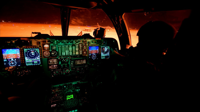 Man cockpit screens atmospheric lighting free wallpaper for desktop - medium preview image