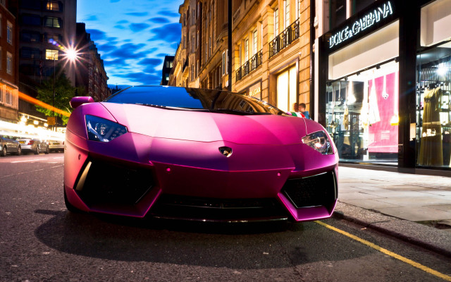 Pink sports car night cityscape free wallpaper for desktop - medium preview image