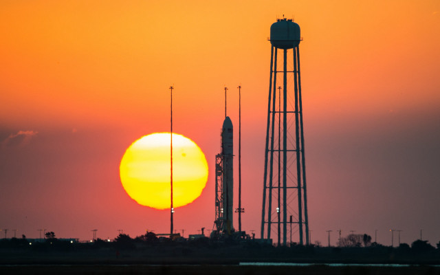 Sunset tower rocket orange sky free wallpaper for desktop - medium preview image
