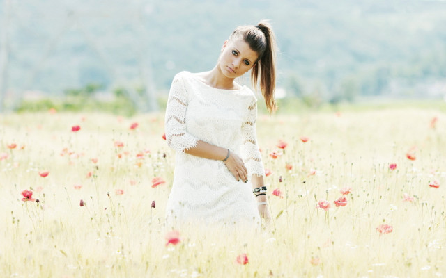 Woman flower field pony tail free wallpaper for desktop - medium preview image