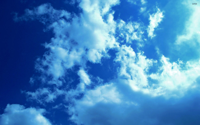 Plane flying blue cloudy sky free wallpaper for desktop - medium preview image