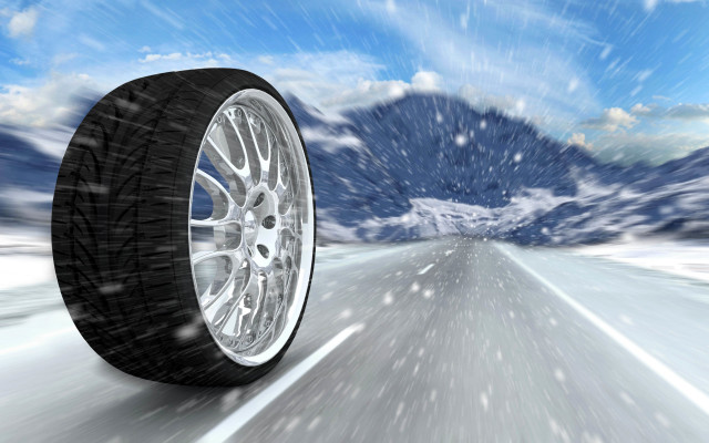 Snowy road mountain tire sky free wallpaper for desktop - medium preview image