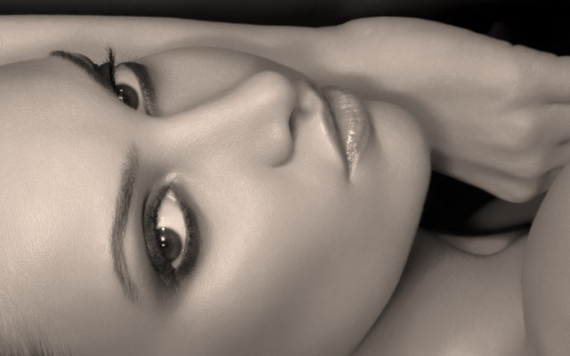 Woman lying closeup blackandwhite realistic free wallpaper for desktop - medium preview image