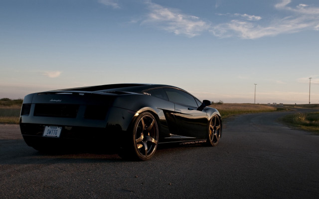 Black sports car evening cloudy free wallpaper for desktop - medium preview image