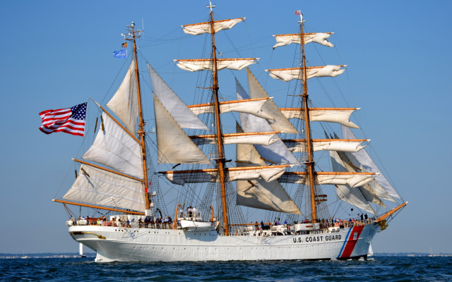 White boat sails ocean flag free wallpaper for desktop - medium preview image