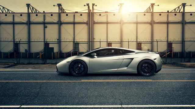 Silver sports car building fence free wallpaper for desktop - medium preview image