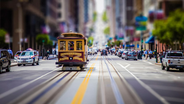 Trolley bus city street blur free wallpaper for desktop - medium preview image