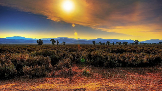 Sunset mountains lake ocean beach free wallpaper for desktop - medium preview image