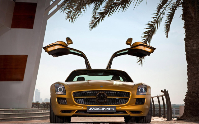Yellow sports car palm tree free wallpaper for desktop - medium preview image