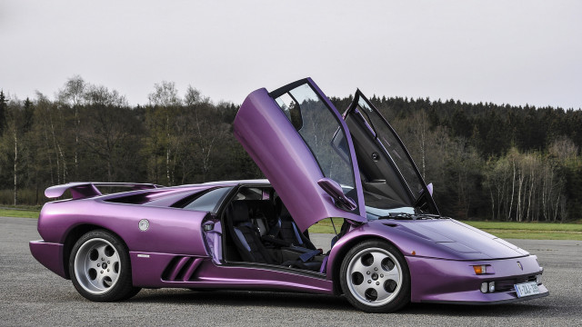 Purple sports car parking lot free wallpaper for desktop - medium preview image