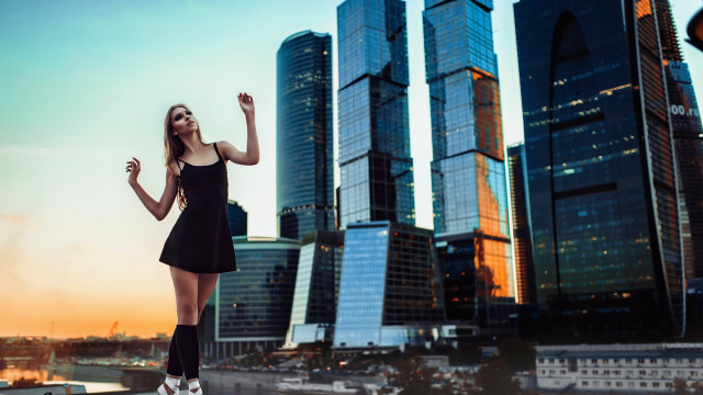 Woman black dress cityscape sunset free wallpaper for desktop - medium preview image