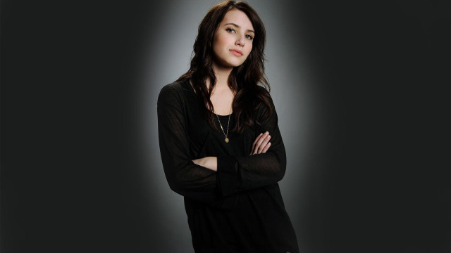 Serious woman crossed arms tachisme free wallpaper for desktop - medium preview image