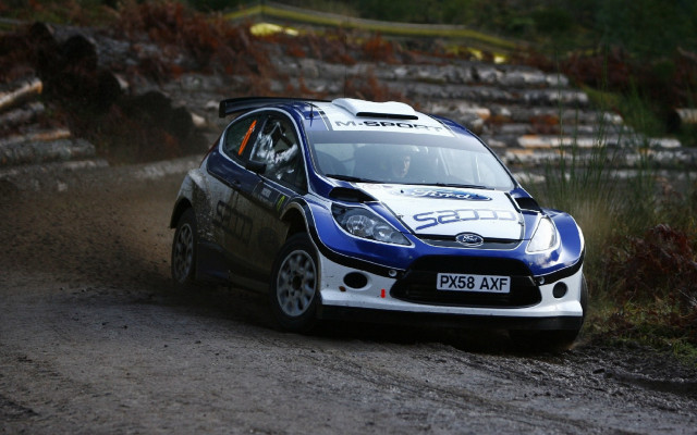 Small car dirt road race free wallpaper for desktop - medium preview image