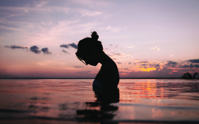 Woman water sunset silhouette tranquil free wallpaper for desktop - medium preview image