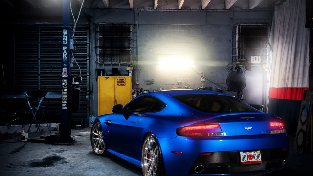 Blue sports car garage man #2 free wallpaper for desktop - medium preview image