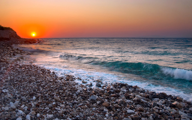 Sunset ocean wave beach rock free wallpaper for desktop - medium preview image