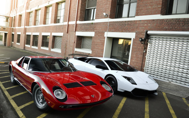 Two cars parking lot garage free wallpaper for desktop - medium preview image