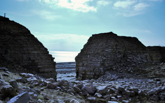 Stone buildings field water sky free wallpaper for desktop - medium preview image