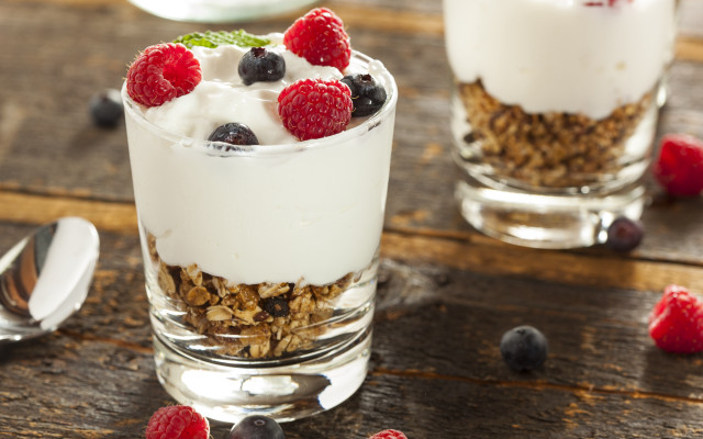 Yogurt berries granola wooden table free wallpaper for desktop - medium preview image