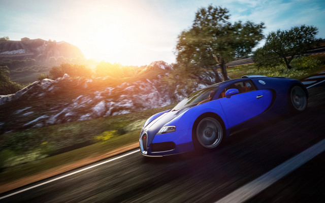 Blue sports car mountains road free wallpaper for desktop - medium preview image