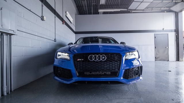 Blue car garage white bricks free wallpaper for desktop - medium preview image