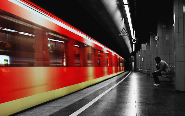 Man bench trainstation night viennese free wallpaper for desktop - medium preview image