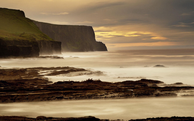 Rocky beach cliff water cloudy #2 free wallpaper for desktop - medium preview image