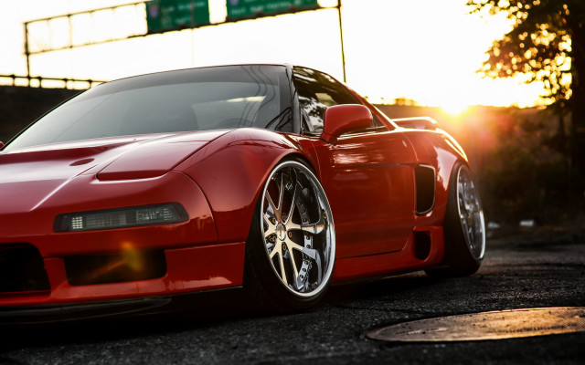 Red sports car sunset front free wallpaper for desktop - medium preview image