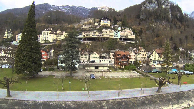 Large building hill trees cars free wallpaper for desktop - medium preview image