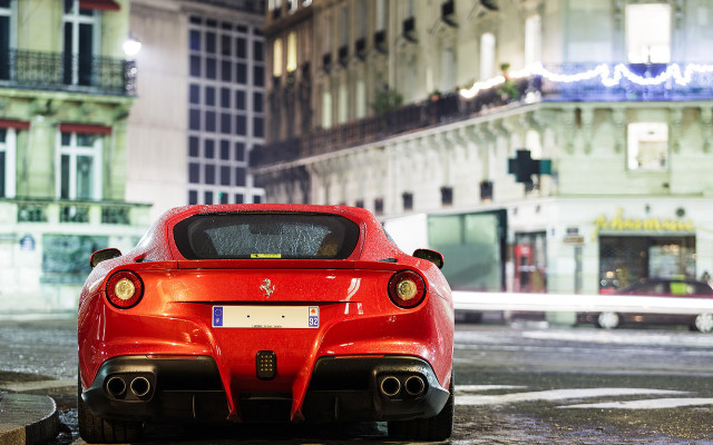 Red sports car rainy night free wallpaper for desktop - medium preview image
