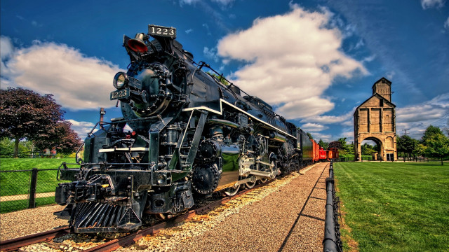 Train parked building bridge cityscape free wallpaper for desktop - medium preview image