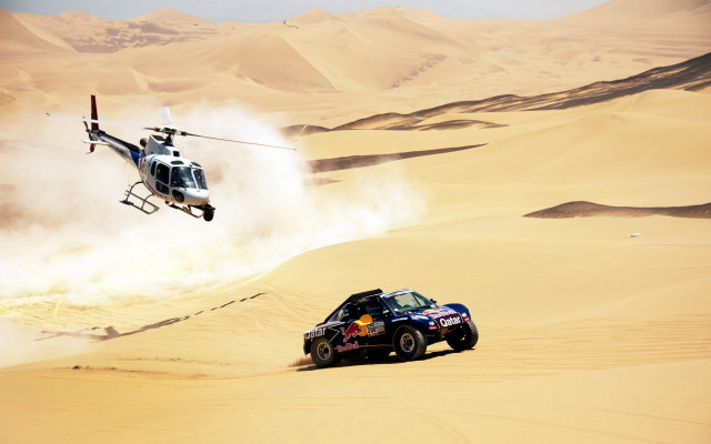 Helicopter over desert car action free wallpaper for desktop - medium preview image