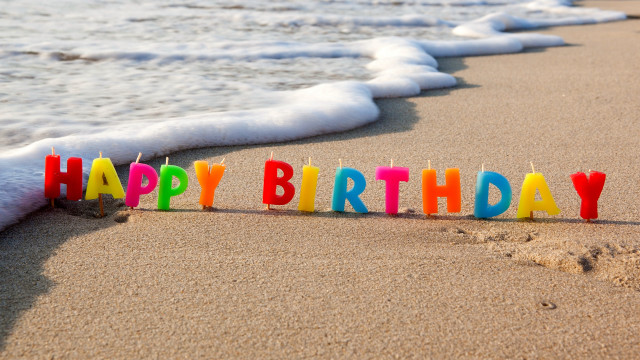 Birthday candle beach ocean waves free wallpaper for desktop - medium preview image