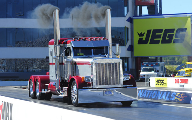 Semi truck smoke building precisionism free wallpaper for desktop - medium preview image
