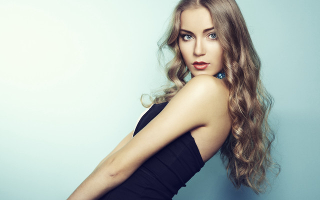 Woman long hair blue background free wallpaper for desktop - medium preview image