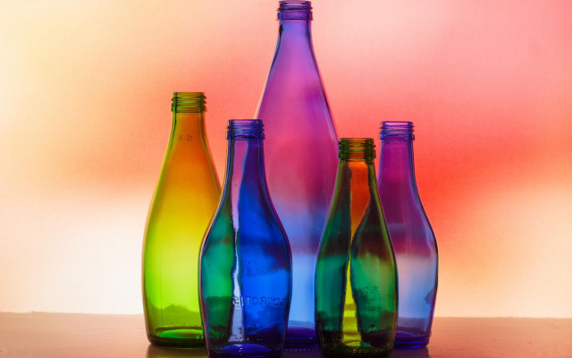 Colorful bottles table gradient background free wallpaper for desktop - medium preview image