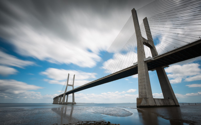 Large bridge over water mountains free wallpaper for desktop - medium preview image
