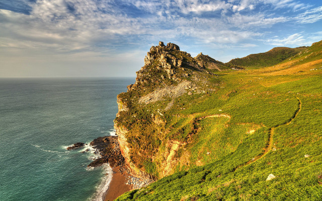 Grassy hill ocean cliff rock free wallpaper for desktop - medium preview image